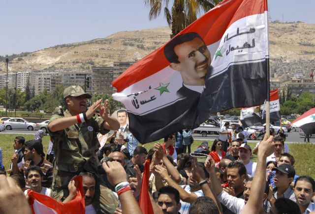 Υποστηρικτές του Μπασάρ αλ-Άσαντ σε επίδειξη δύναμης στη Συρία